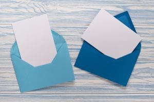 Empty Christmas cards, envelopes with template letter. Mockup for seasonal greetings.